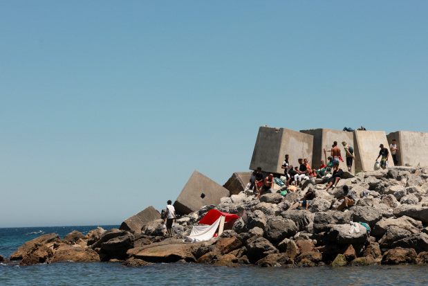 World News: Tougher action sought against migrant surge
